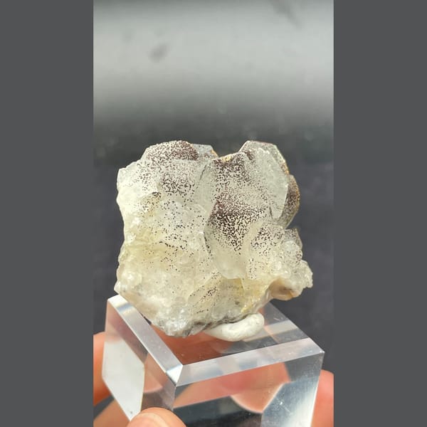 Fluorescent calcite with pyrite from Hunan — alternate view
