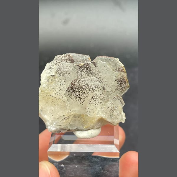 Fluorescent calcite with pyrite from Hunan — detail view