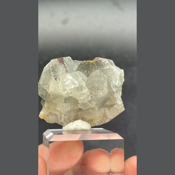 Fluorescent calcite with pyrite from Hunan — detail view