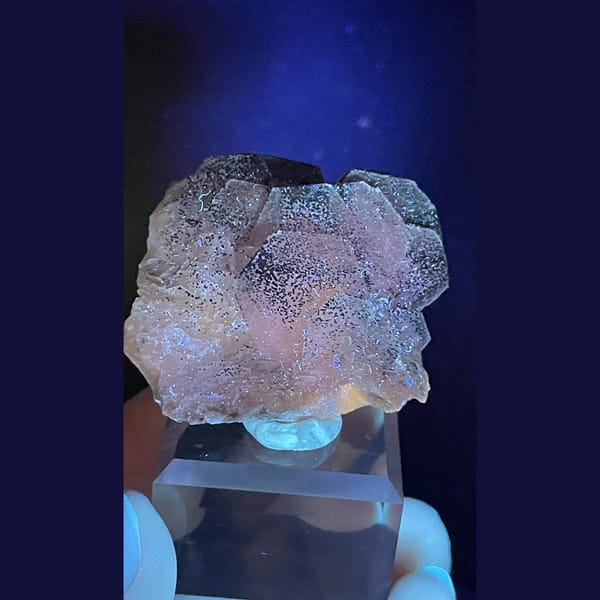 Fluorescent calcite with pyrite from Hunan — detail view