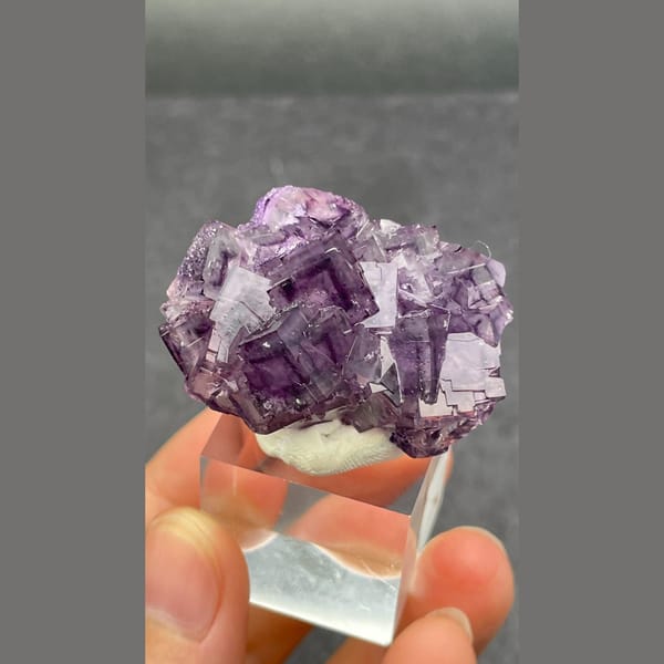 Purple fluorite cluster with geometric phantoms from Henan — alternate view
