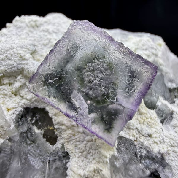 Purple-edged crystal in crystal fluorite cube from Yaogangxian, Hunan — complete view