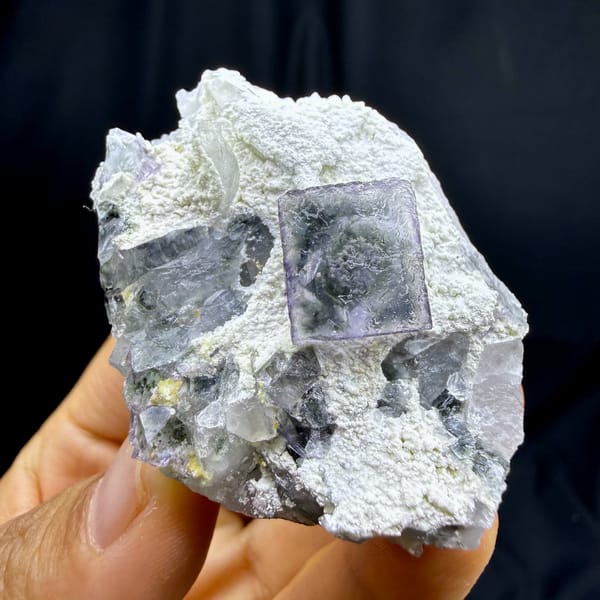 Purple-edged crystal in crystal fluorite cube from Yaogangxian, Hunan — alternate view