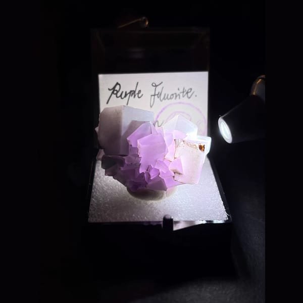 Porcelain-coated purple fluorite from Weishan — detail view