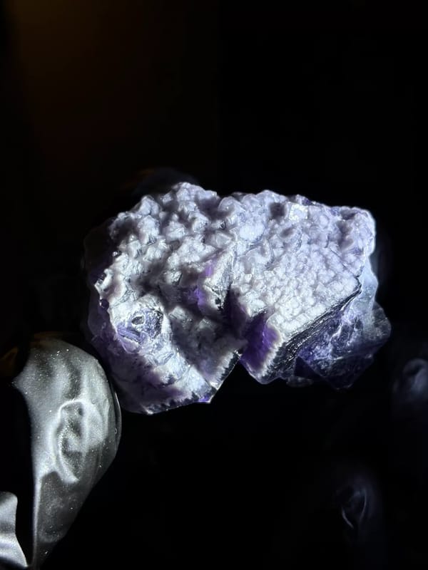 Complete upper rear view showing quartz-coated fluorite faces