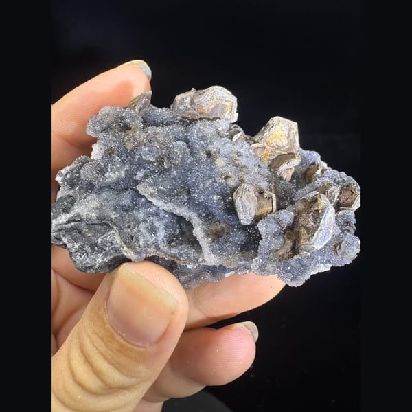 Grey sugary calcite with pseudomorph crystals from Longyan, Fujian — complete view