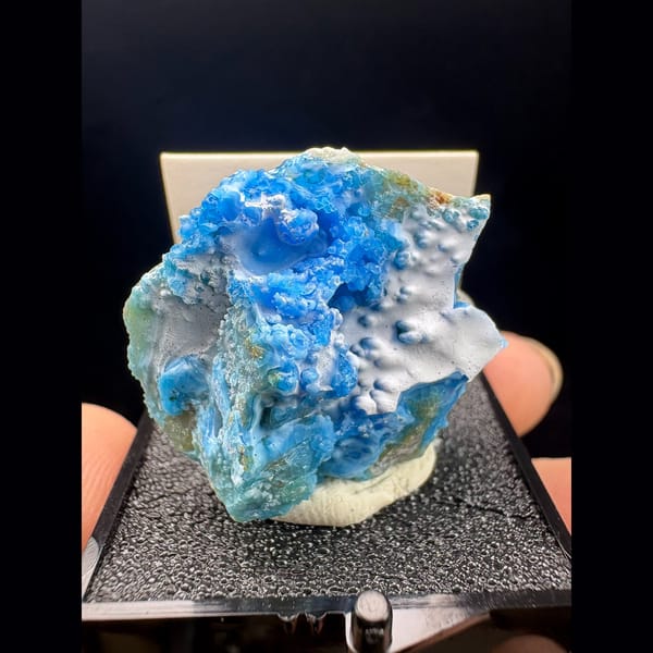 Small vivid blue allophane with frosty white gibbsite from Qinglong — complete view
