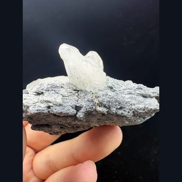 White dogtooth calcite on grey matrix from Longyan, Fujian — alternate view