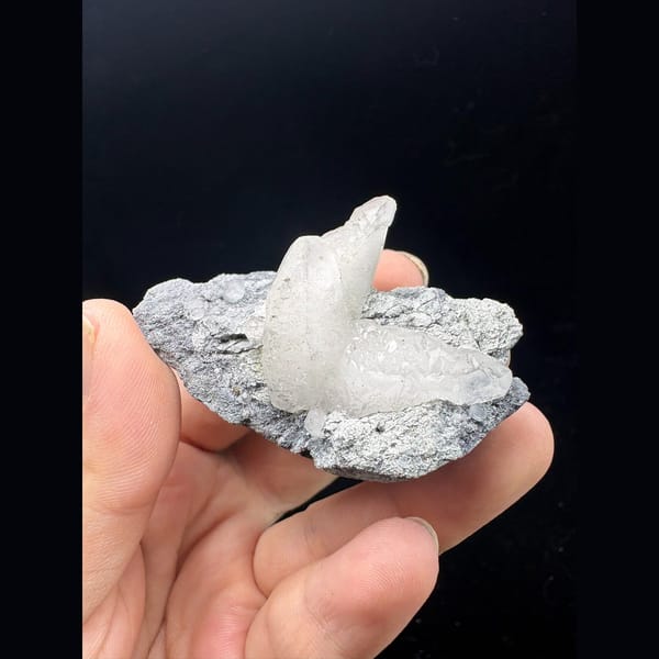 White dogtooth calcite on grey matrix from Longyan, Fujian — alternate view