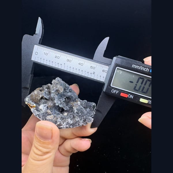Grey-blue sugary calcite with pseudomorph crystals from Longyan — alternate view