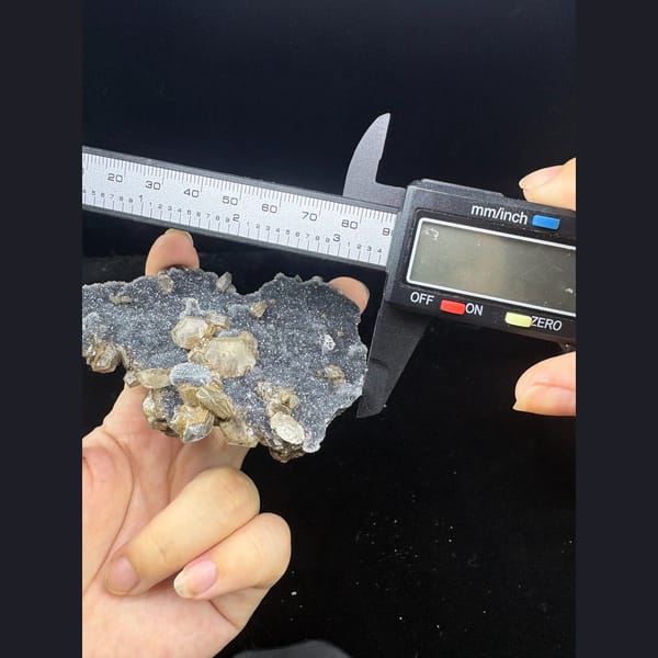 Grey sugary calcite with pseudomorph crystals from Longyan — alternate view