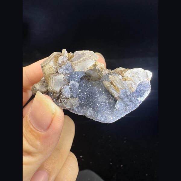 Small grey sugary calcite with pseudomorphs from Longyan — complete view