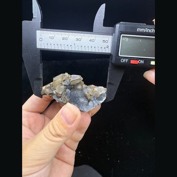 Small grey sugary calcite with pseudomorphs from Longyan — alternate view