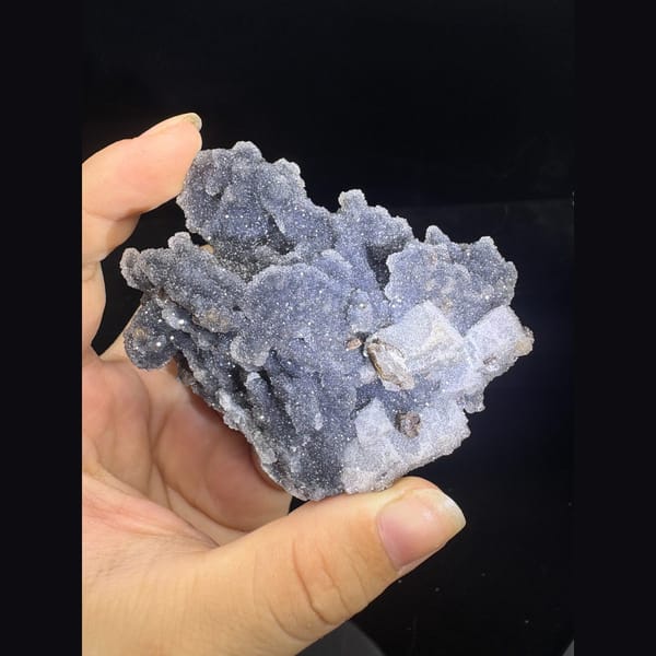 Grey sugary calcite with fluorite pseudomorphs from Longyan — complete view