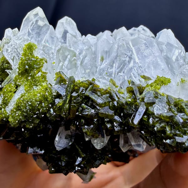 Clear quartz points on dark green epidote from Sichuan — detail view