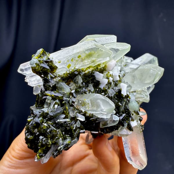 Double terminated clear quartz crystals with dark green epidote from Sichuan — complete view