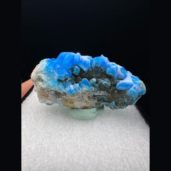 Rounded glossy blue allophane from Qinglong, Guizhou — complete view
