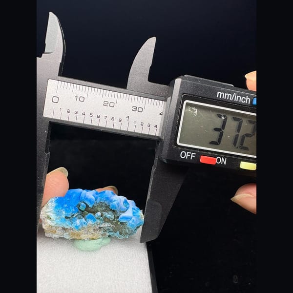 Rounded glossy blue allophane from Qinglong, Guizhou — alternate view