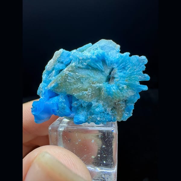 Small frothy bright blue allophane from Qinglong, Guizhou — complete view