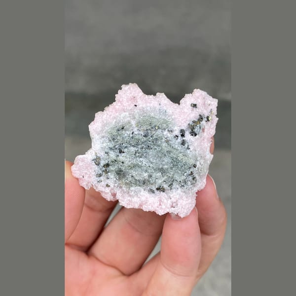 Frosty pale pink rhodochrosite with quartz from Bulgaria — detail view