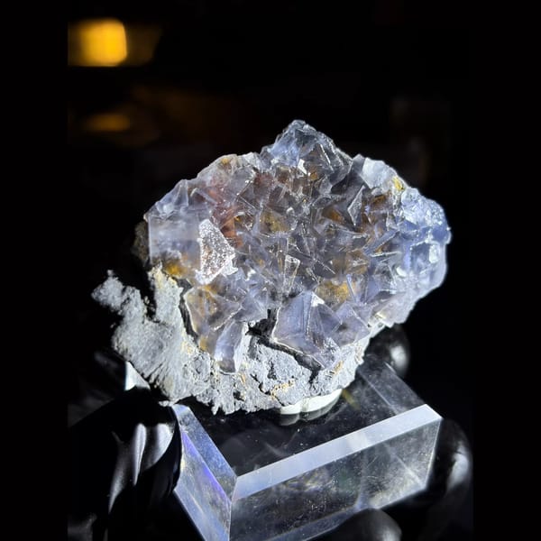 Icy blue fluorite with limonite from Yunnan — alternate view