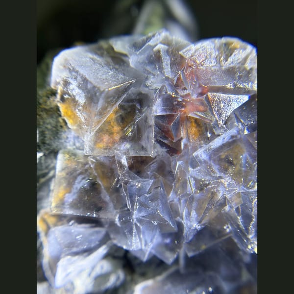 Icy blue fluorite with limonite from Yunnan — alternate view