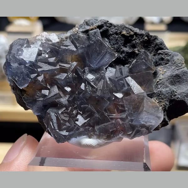Icy blue fluorite with limonite from Yunnan — detail view