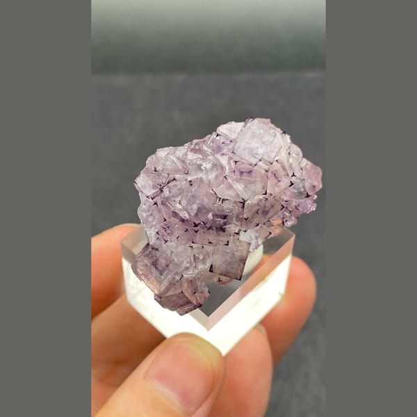 Pale lilac phantom fluorite with violet corners from Luoyang — detail view