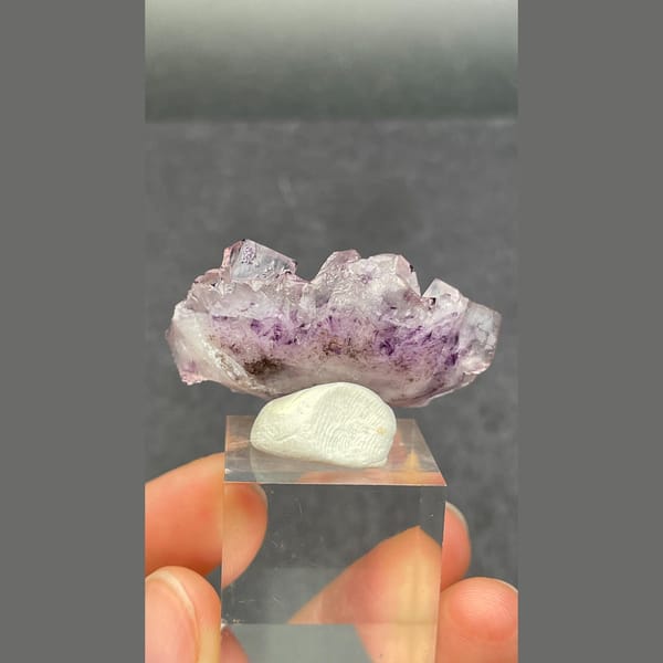 Pale lilac phantom fluorite with violet corners from Luoyang — detail view