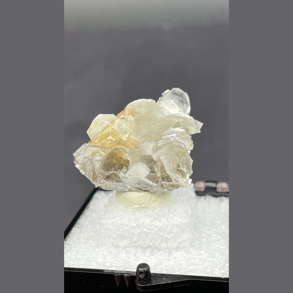Scheelite with mica from Xuebaoding — detail view