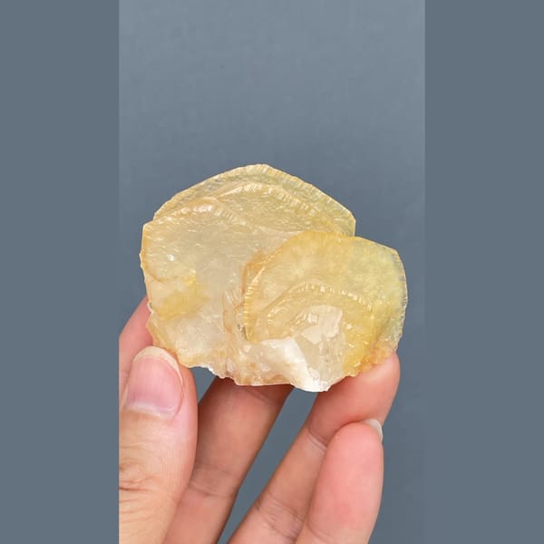 Honey yellow calcite with growth lines from Qingyuan — alternate view