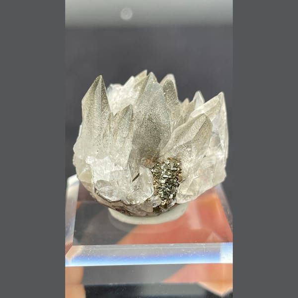 Fluorescent calcite with pyrite from Hubei — complete view