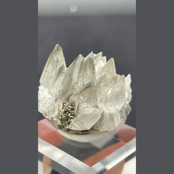 Fluorescent calcite with pyrite from Hubei — alternate view