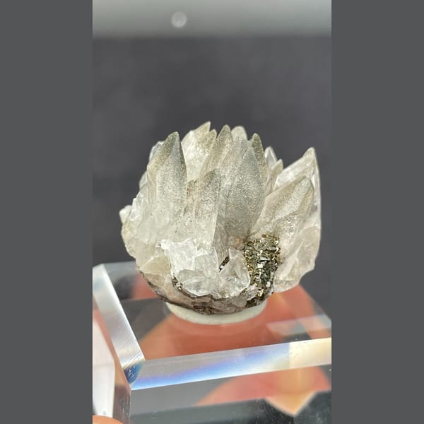 Fluorescent calcite with pyrite from Hubei — alternate view