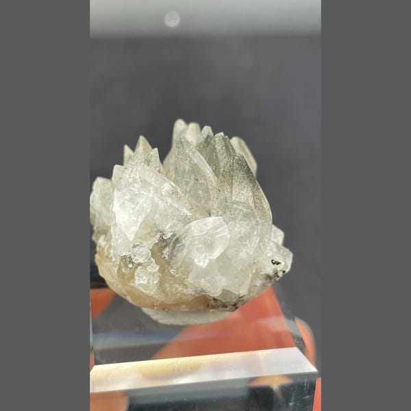Fluorescent calcite with pyrite from Hubei — detail view