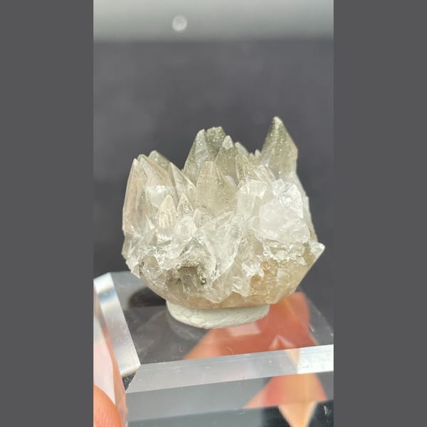 Fluorescent calcite with pyrite from Hubei — detail view