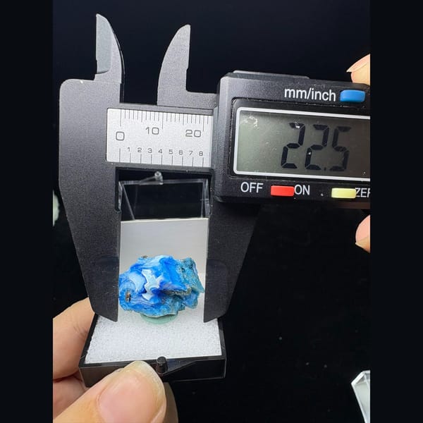 Small vivid blue allophane with white swirls from Qinglong — alternate view