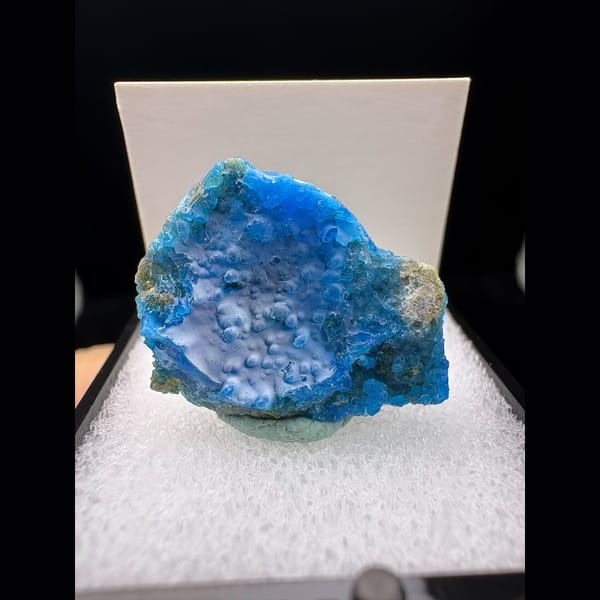 Small rounded blue allophane with a bubbly face from Qinglong — complete view