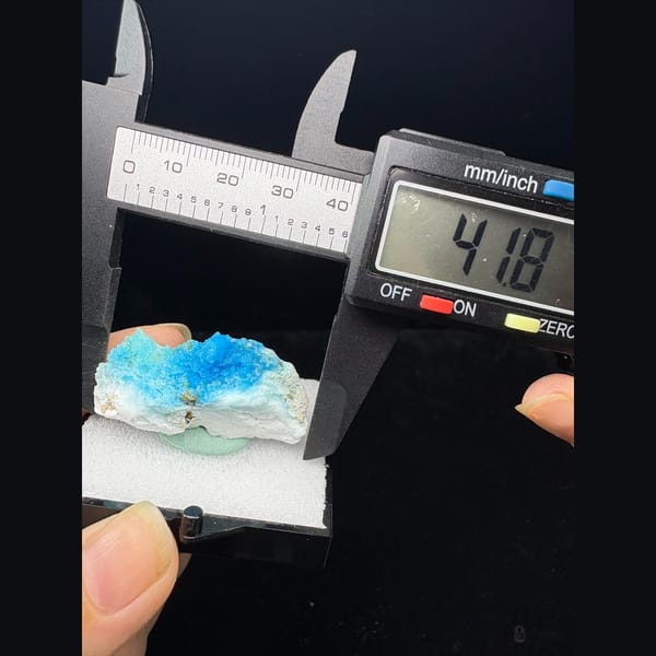 Bright blue allophane crust on white matrix from Qinglong — alternate view