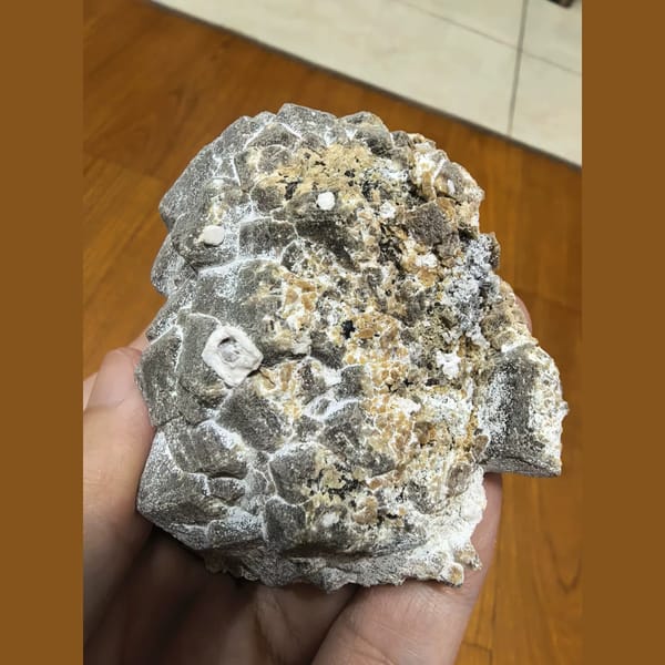 Unusual pale garnet cluster — alternate view