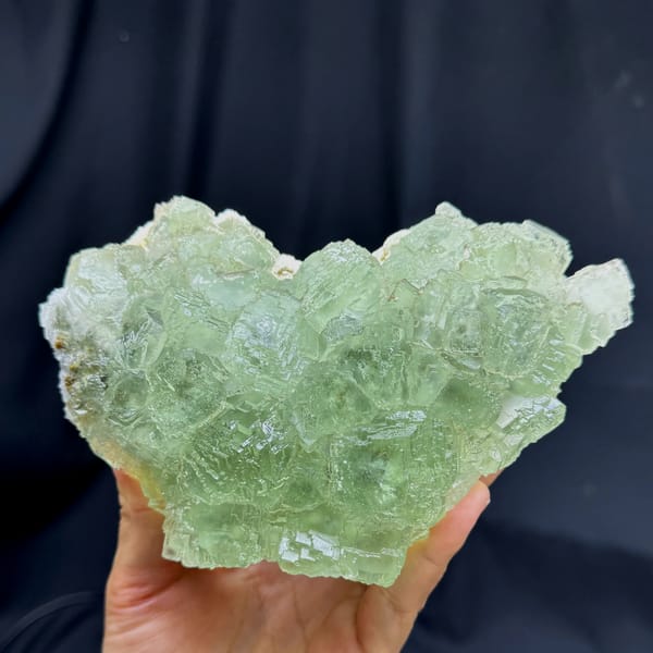 Large glassy light green fluorite cluster from Guangdong — complete view