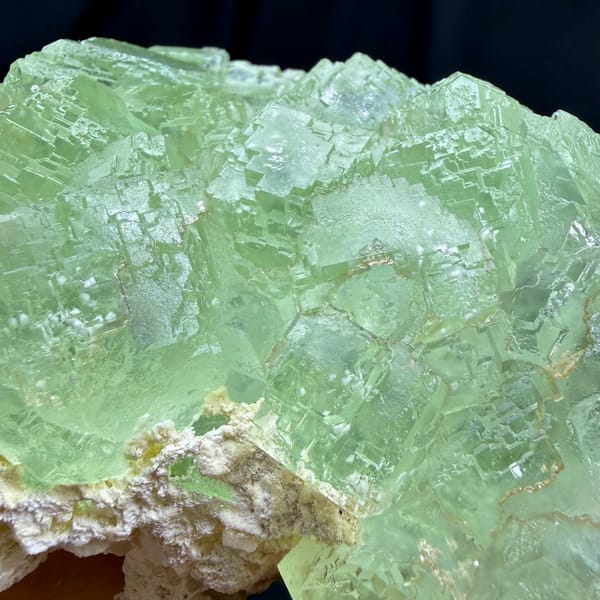 Large glassy light green fluorite cluster from Guangdong — detail view