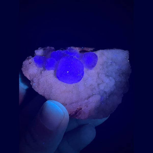 Lavender purple fluorite on white sugary quartz from Qinglong — detail view