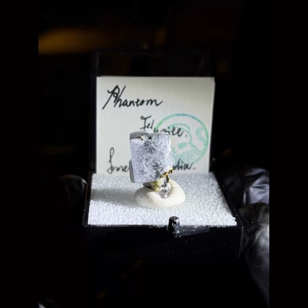Porcelain phantom fluorite with pyrite — alternate view