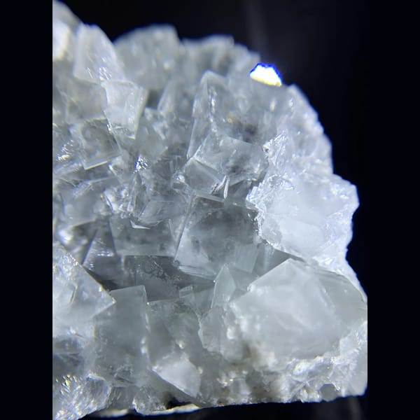 Clear cubic fluorite cluster from Xianghualing — alternate view