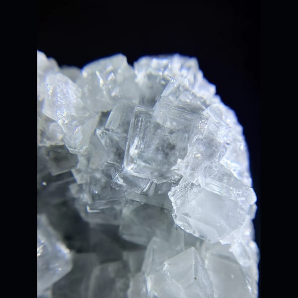 Clear cubic fluorite cluster from Xianghualing — alternate view