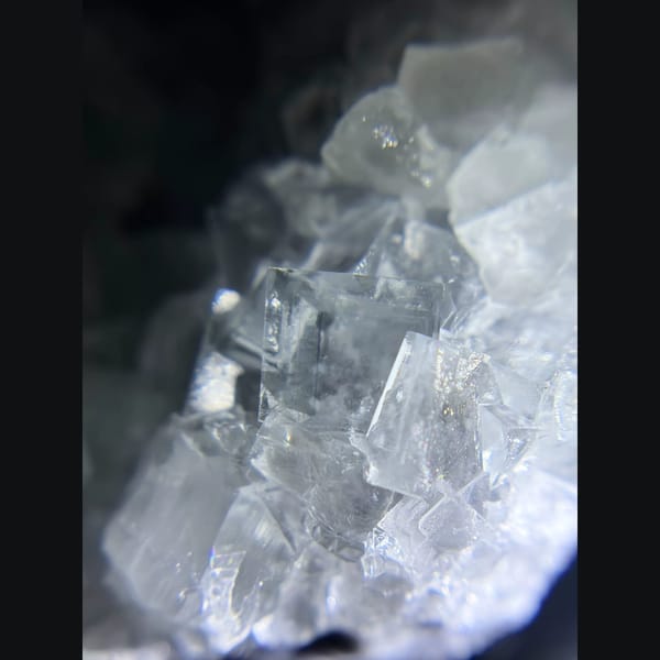 Clear cubic fluorite cluster from Xianghualing — detail view