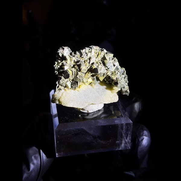 Pyrite on zoned tabular barite from Morocco — alternate view