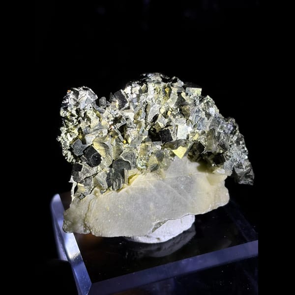 Pyrite on zoned tabular barite from Morocco — detail view