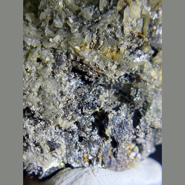 Pyrite on zoned tabular barite from Morocco — detail view